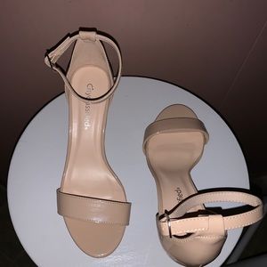 A used pair of Nude heels from Cityclassified.